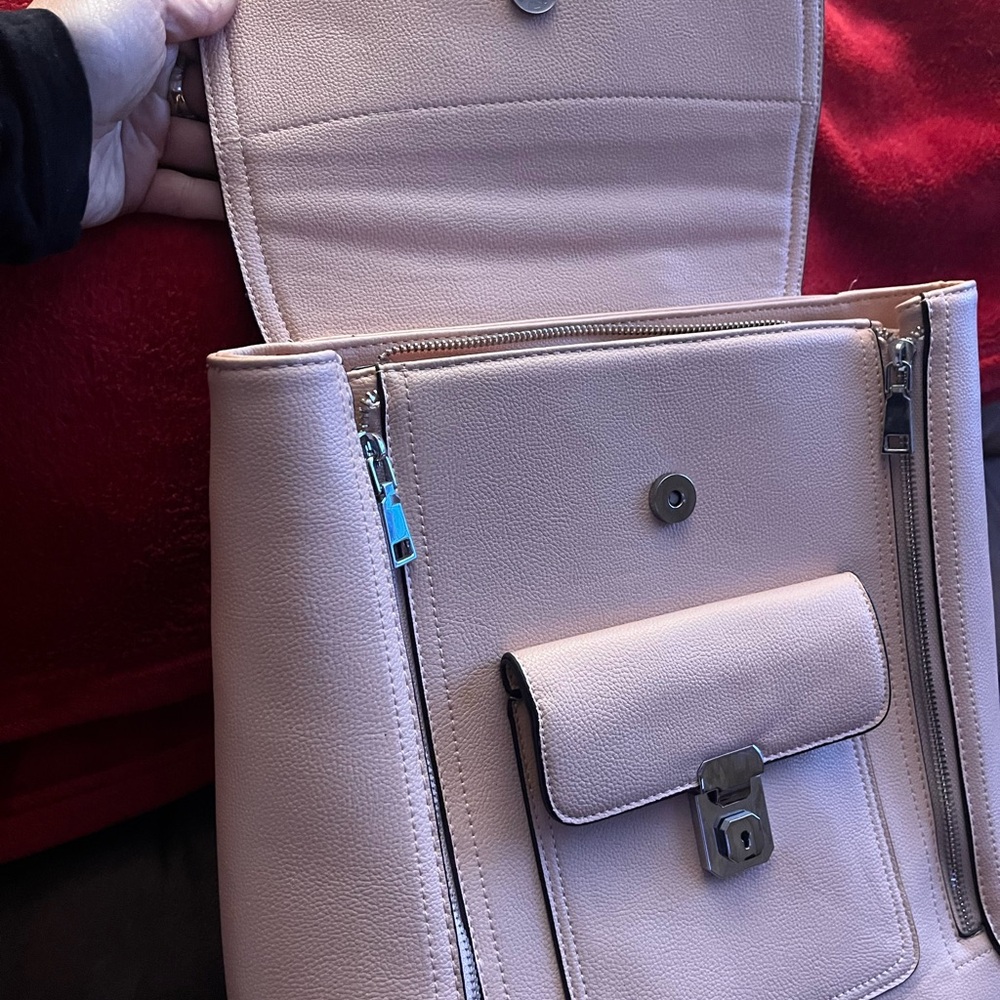 Chic Pink Backpack with Structured Design and Metal Accents - Picture 3 of 8